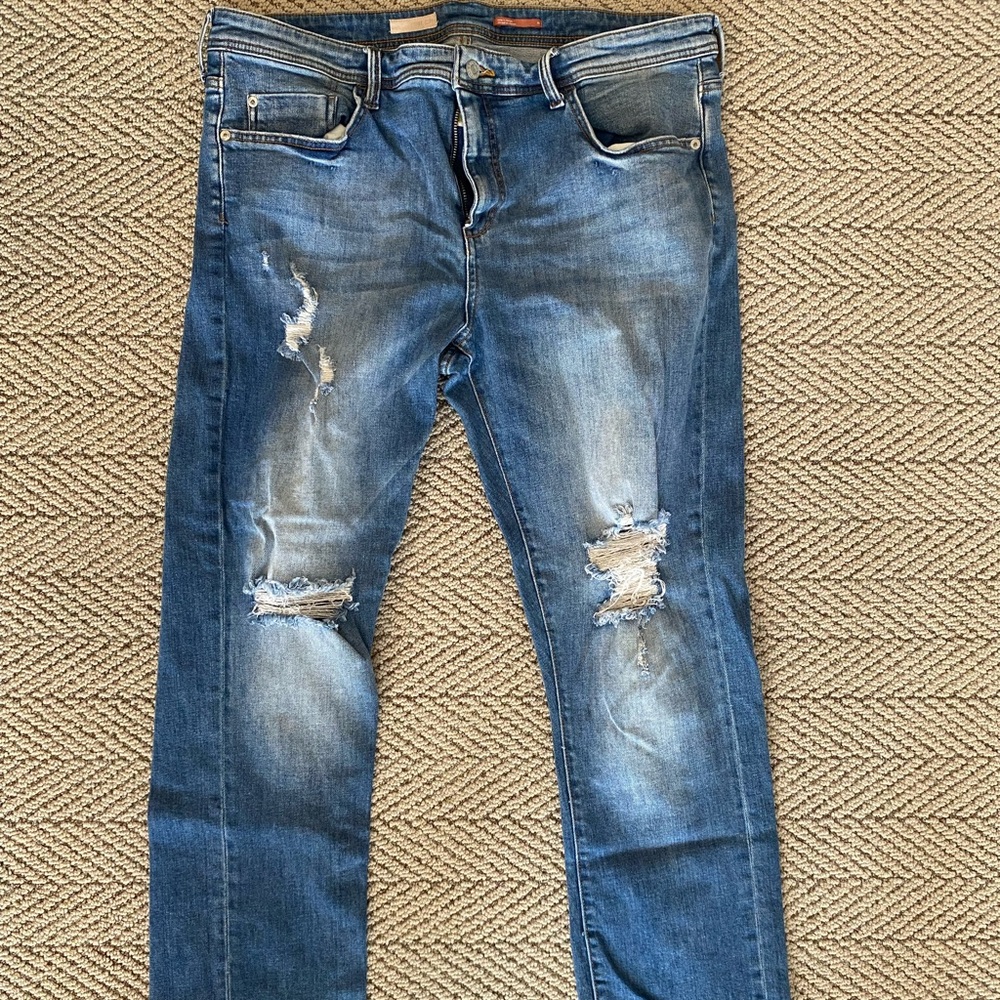 Distressed Blue Jeans